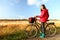 Autumn / fall woman biking