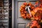 Autumn fall wreath decorating front door