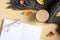 Autumn flat lay composition. Top view feminine workspace with coffee cup, glasses, blank paper notebook, knitted plaid, fallen