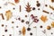 Autumn flat lay. Fall leaves, berries, acorns, walnuts, cinnamon,anise , cotton and pine cones on white background. Autumnal