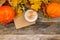 Autumn flatlay composition with letter, craft envelope, coffee latter cup mug paper card with text written Hello Autumn