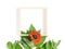 Autumn flower arrangement. Empty frame template decorated with sunflower and green leaves. Seasonal autumn concept. White