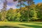 Autumn foliage colors in Loire valley public park with garden, France