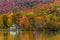 Autumn foliage and reflection in Vermont, Elmore state park