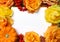 Autumn frame. Maple, oak leaves, orange pumpkin, roses, rowan berries and empty white paper card. Fall and Thanksgiving concept. F