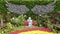 Autumn garden with little cherub statue