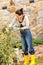 Autumn gardening young woman clipping bush hobby