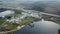 Autumn golf field on lake shore Lithuania Aerial drone top view