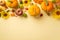 Autumn harvest concept. Top view photo of sunflowers vegetables pumpkins apples pears rowan berries walnuts and physalis on