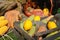 Autumn harvest in a wooden box and basket. Corn on the background of hay