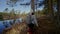 Autumn hike backpacker lifestyle woman walking on trek trail in forest outdoors