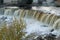 Autumn in Keila Joa waterfall. Flowing water. River in Estonia, natural environment background.