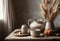 Autumn kitchen still life - pumpkin, enameled dishes in rustic style on a wooden table with a linen tablecloth