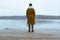 autumn lake season woman in coat at wooden pier