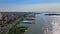 Autumn landscape aerial view of Manhattan skyline with lower Manhattan on large docked ship on the Red Hook Container