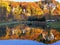 Autumn landscape. Beautiful autumn forest reflection in the water. Ojcowski National Park. Poland.