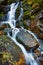 Autumn landscape of beautiful waterfall in the Ukrainian Carpathians