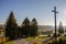 autumn landscape. Catholic cross on the background of a clear sky. heaven on earth