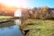 Autumn landscape of the countryside: old non-working watermill n