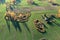 autumn landscape with fields, groves and old homestead, aerial