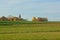 Autumn landscape with historic church in the Flemish countryside