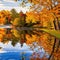 Autumn landscape with lake and colorful trees. Reflection in water AI Generated Generative AI