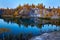 Autumn landscape with lake and forest hills