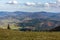 Autumn landscape of mountain hills covered with colorful forests. Zywiec Beskids