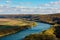 Autumn Landscape - river, sky with clouds, fields.