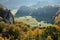 Autumn landscape with a small meandering water stream