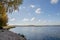 autumn landscape. stand and look into the distance standing on the shore of the lake. think about life and the infinity of being.