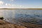 autumn landscape. stand and look into the distance standing on the shore of the lake. think about life and the infinity of being.