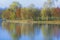 Autumn landscape with trees reflection on lake