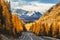 Autumn landscape. View of the Chui tract, autumn taiga, north Chuysky ridge, snow-capped mountain peaks. Altai Republic