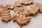 Autumn leaf shaped cookie of gingerbread dough. Autumn festive cookies. Gingerbread cookies. Homemade thanksgiving dessert