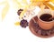 Autumn leaves and cup of coffee, breakfast background