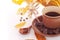 Autumn leaves and cup of coffee, breakfast background