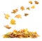 Autumn leaves falling onto heap