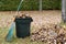 Autumn leaves in a garbage can - Horizontal