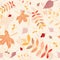 Autumn leaves seamless pattern with light yellow background.