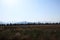 autumn meadows with mountains at horizon