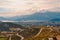 Autumn Mediterranean landscape on cloudy misty day. Autumn Balkan road trip: clouds, mountains, hills and roads. Montenegro