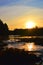 Autumn morning in Koiteli rapid, Kiiminki river. Sunset, light of dawn. Beatiful colors, flowing water.