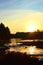 Autumn morning in Koiteli rapid, Kiiminki river. Sunset, light of dawn. Beautiful sky, flowing water.