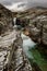 Autumn mountain landscape of Rondane National Park in Norway, waterfall near Peer Gynt hytta