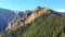 Autumn mountain landscape with yellow larch tree