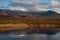 Autumn mountains across the river.