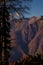 Autumn Mountains Landscape. Mountain peaks,  forest, pine trees and blue sky