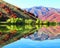 Autumn mountains with reflection in water