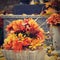 Autumn nature concept.Beautiful autumn decorations. Colorful autumn flowers at the cemetery - Halloween.